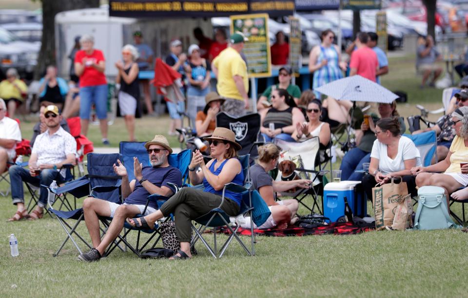 Attendees applaud The Rumble featuring Chief Joseph Boudreaux Jr. during last year's Levitt AMP Green Bay Music Series at Leicht Memorial Park in Green Bay. The 10-week music series is returning for its second season this summer.
