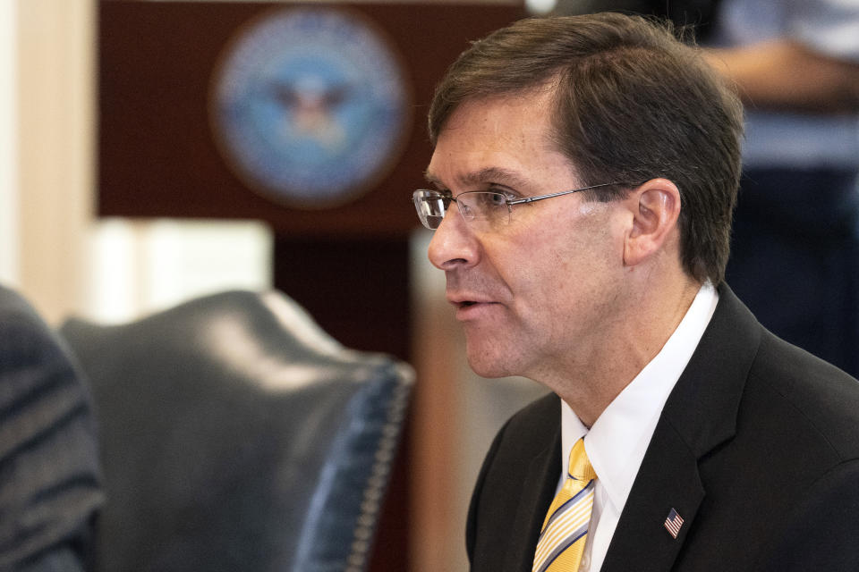 FILE - In this Oct. 8, 2020, file photo, Secretary of Defense Mark Esper speaks before a meeting with Romanian Defense Minister Nicolae Ciuca, at the Pentagon, in Washington. President Donald Trump has fired Esper. (AP Photo/Alex Brandon, File)