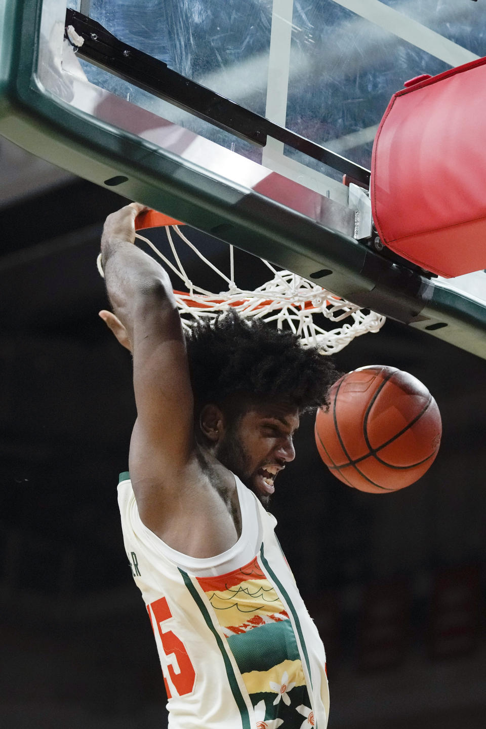 Miami forward Norchad Omier (15) dunks a ball during the first half of an NCAA college basketball game against Wake Forest, Saturday, Feb. 18, 2023, Coral Gables, Fla. (AP Photo/Rebecca Blackwell)