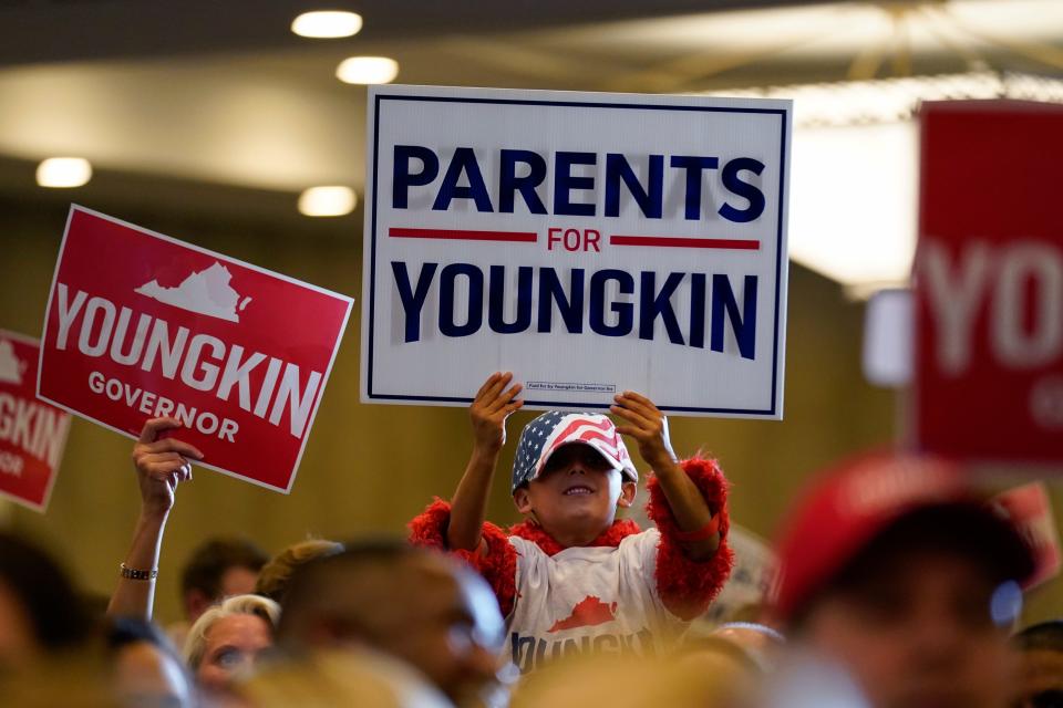 Supporters of Republican gubernatorial candidate Glenn Youngkin gather for an election night party in Chantilly, Va.,Tuesday , Nov. 2, 2021. (AP Photo/Andrew Harnik) ORG XMIT: VAAH303