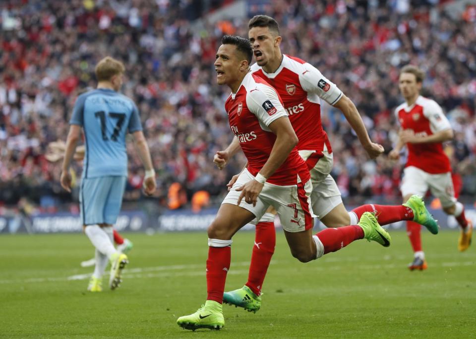 Alexis Sanchez celebrates his goal at Wembley