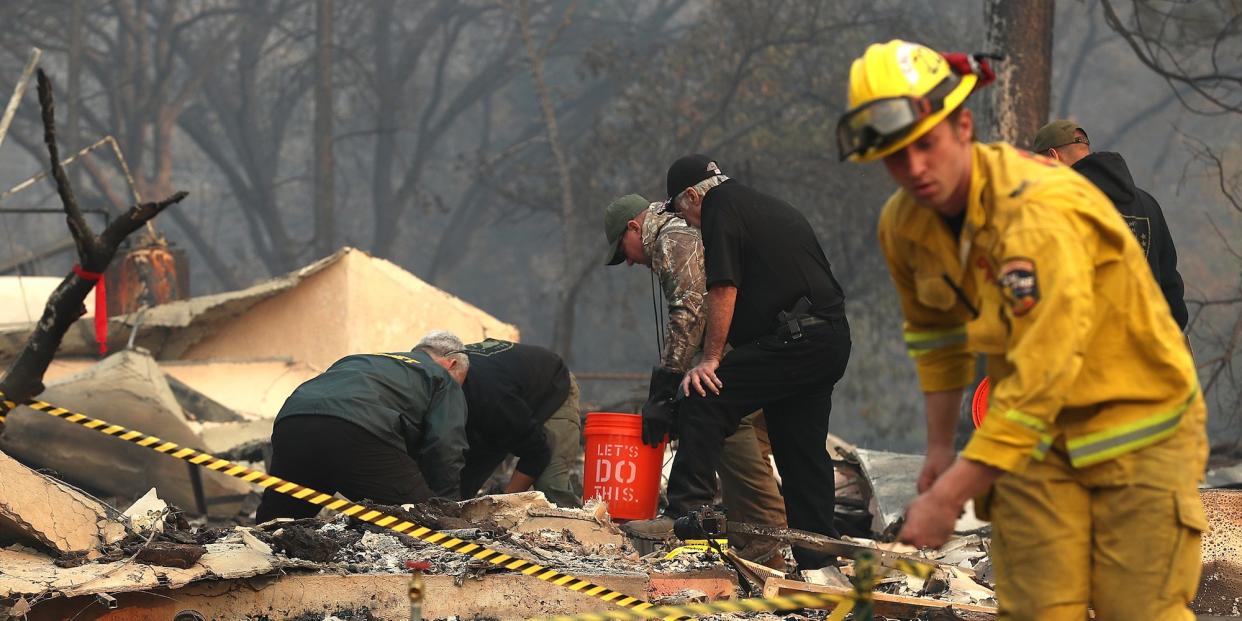 camp fire searching the rubble