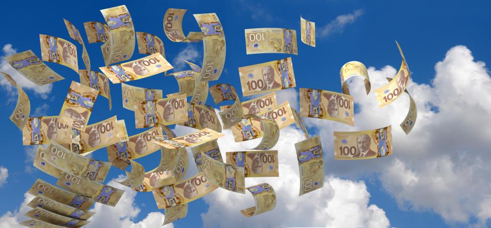 Flying Canadian Dollar (isolated with clipping path)