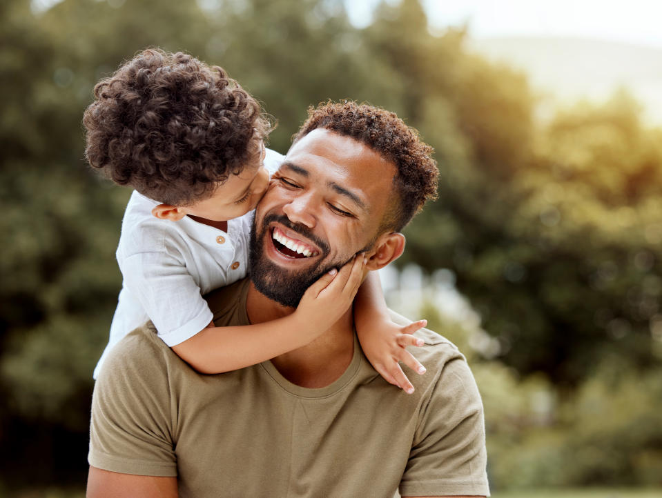 a child hugging their father