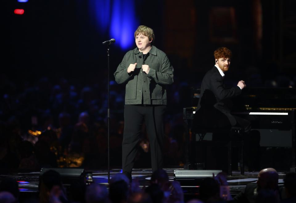 Lewis Capaldi performs on stage at the Brit Awards 2020 in London, Tuesday, Feb. 18, 2020. (Photo by Joel C Ryan/Invision/AP)