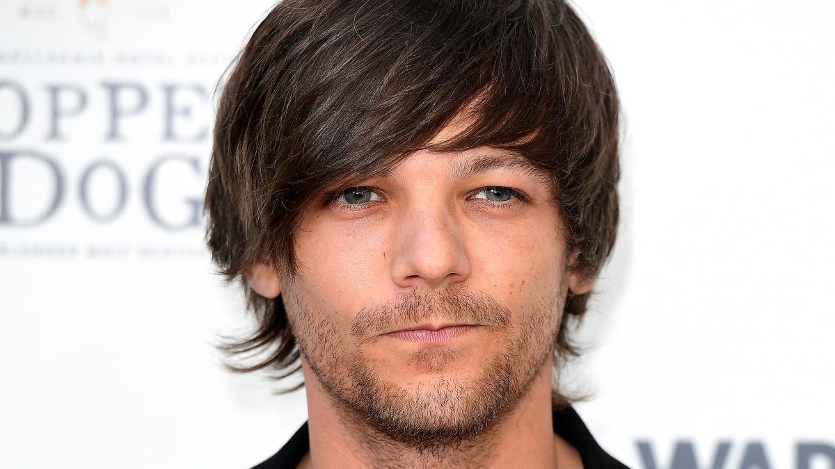 Louis Tomlinson on loss and love: 'The dark side I've been through gives me  strength', Louis Tomlinson