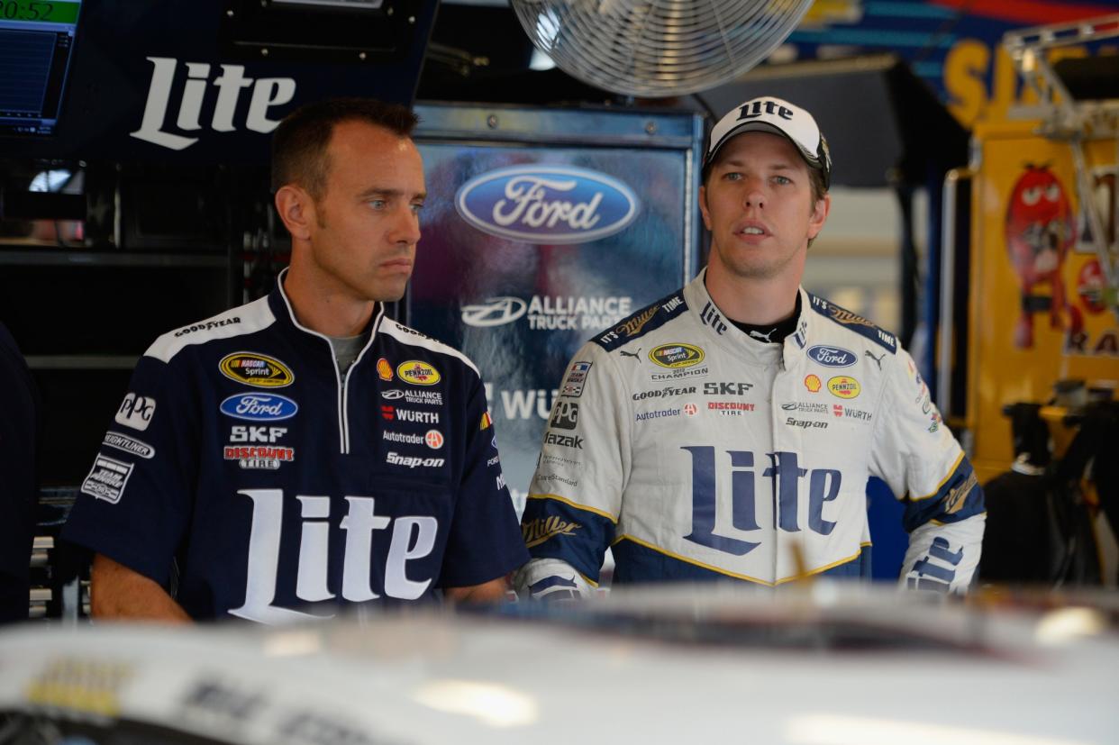 Crew chief Paul Wolfe (L) has already served two races of his three-race suspension.