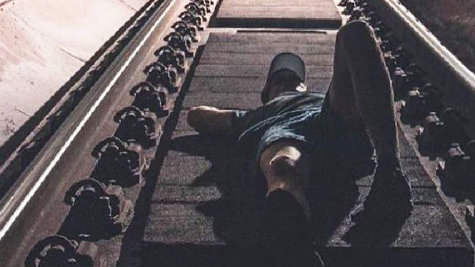 Wannabe social media stars are filming themselves laying across active train tracks. Source: Instagram