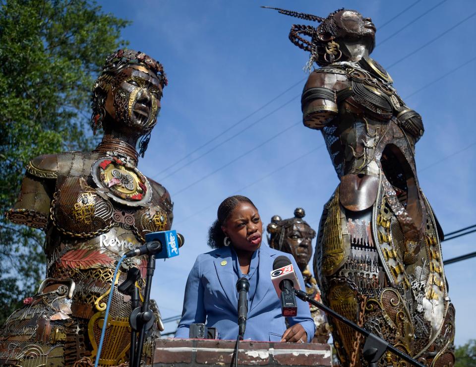 JaTaune Bosby, executive director of the ACLU of Alabama, speaks Tuesday during a news conference at the Mothers of Gynecology Monument in Montgomery.