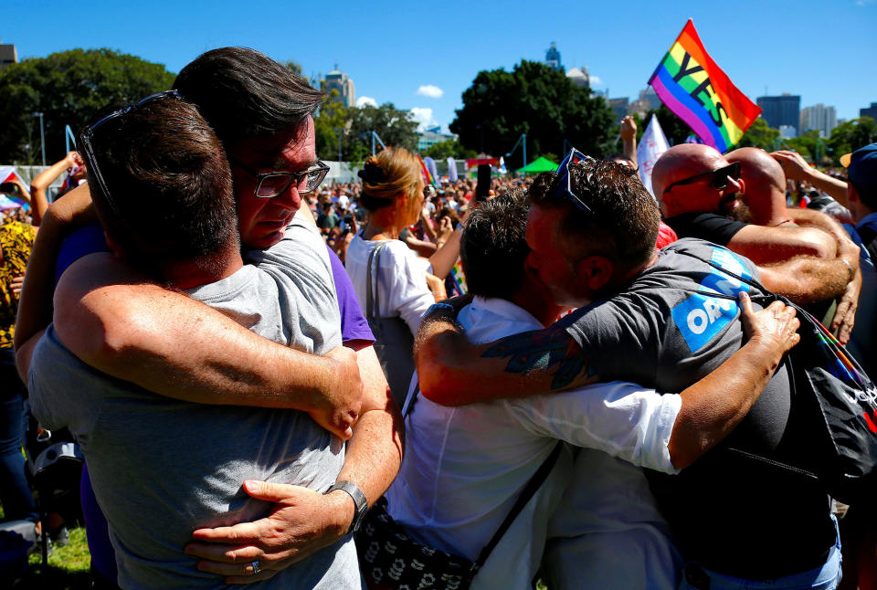 <p>People celebrate after it was announced the majority of Australians support same-sex marriage in a national survey, paving the way for legislation to make the country the 26th nation to formalize the unions by the end of the year, at a rally in central Sydney, Australia, Nov. 15, 2017. (Photo: David Gray/Reuters) </p>