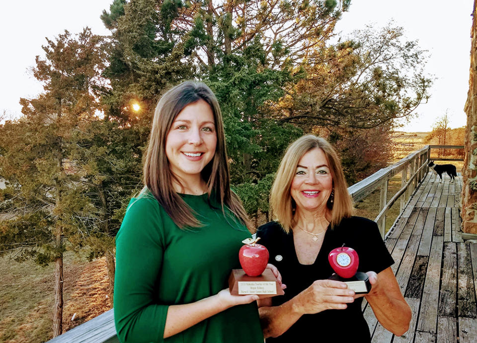 Megan Helberg and her mother, Sue McNeil, post for a photo with their Nebraska Teacher of the Year awards. (Courtesy of Megan Helberg)