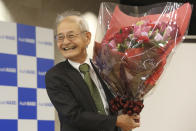 Winner of Nobel Prize in chemistry Akira Yoshino smiles during a press conference in Tokyo, Wednesday, Oct. 9, 2019. Yoshino is one of three scientists to have won this year's Nobel Prize in chemistry for their contributions to lithium-ion batteries, which have reshaped energy storage and transformed cars, mobile phones and many other devices in an increasingly portable and electronic world. (AP Photo/Koji Sasahara)