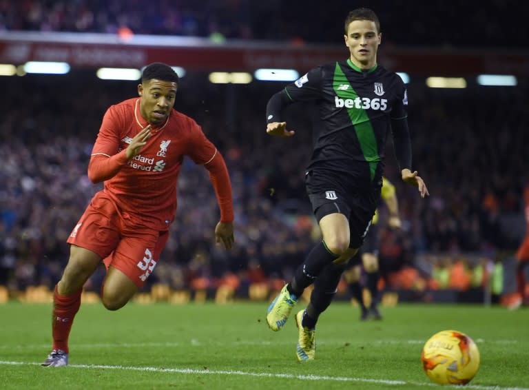 Liverpool's midfielder Jordon Ibe (L) chases the ball during the English League Cup semi-final second leg football match between Liverpool and Stoke City at Anfield in Liverpool, England, on January 26, 2016