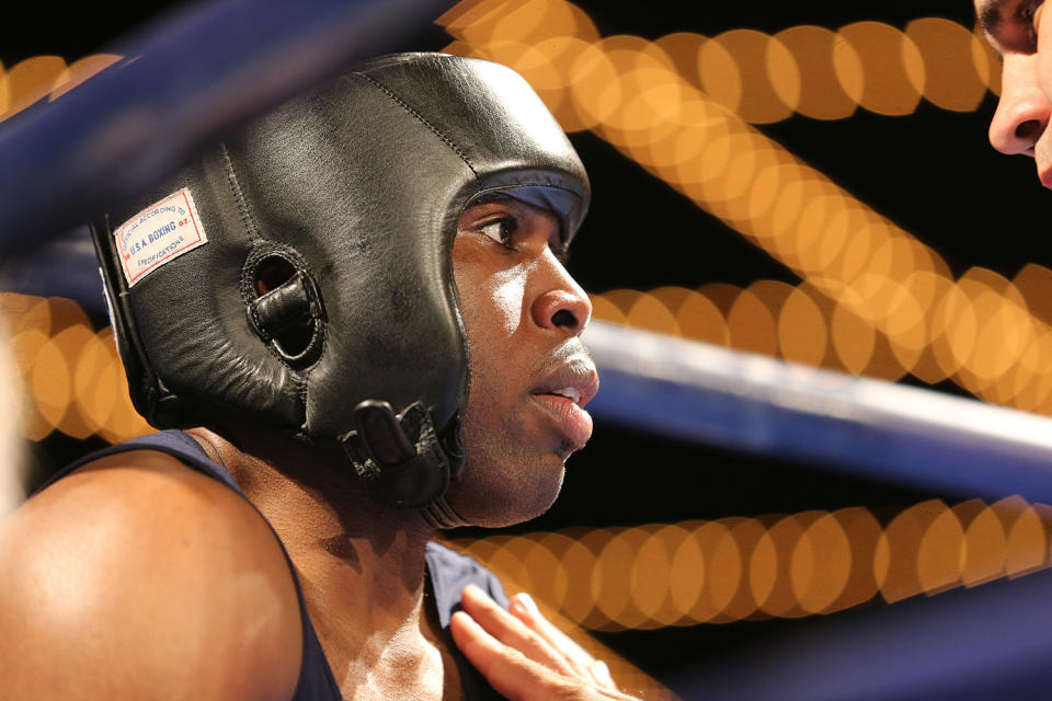 <p>NYPD officer Jamaal Spence gets instructions in his corner during the NYPD Boxing Championships at the Theater at Madison Square Garden on June 8, 2017. (Photo: Gordon Donovan/Yahoo News) </p>