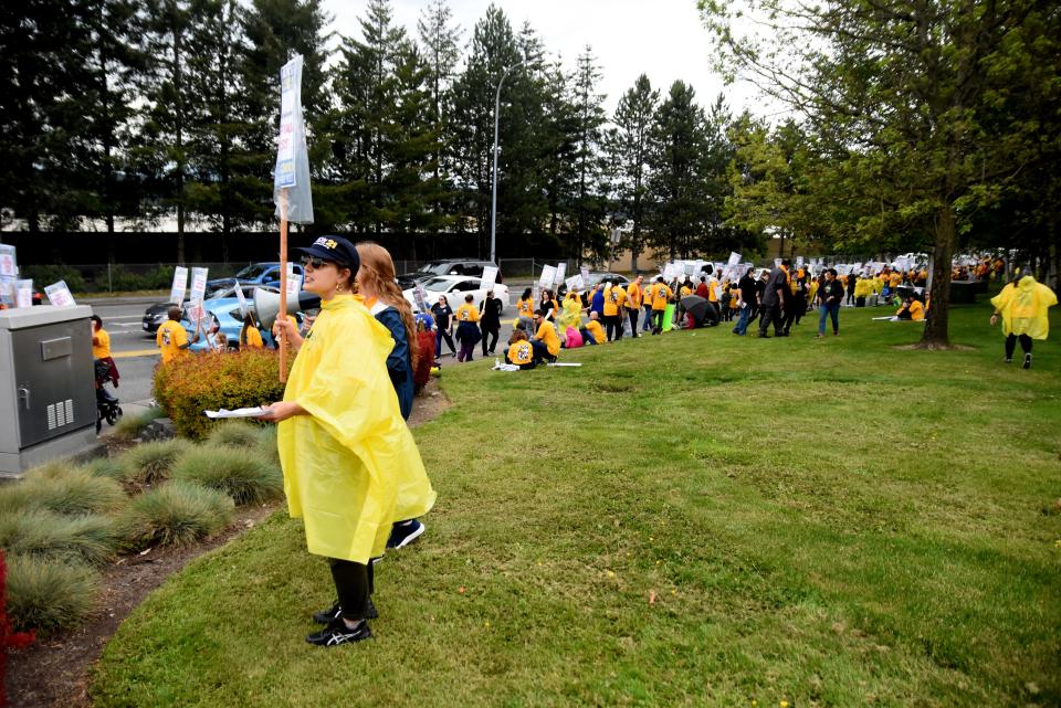 Nurses at St. Michael Medical Center in Silverdale picket as contract negotiations continue with hospital management. The nurses say they are seeking "safer" staffing levels and competitive wages.