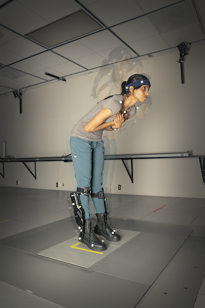 In this composite time series image, a test subject wearing a robotic lower-limb exoskeleton pitches forward but doesn’t need to step to maintain her balance. Candler Hobbs, Georgia Institute of Techology