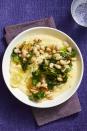 <p>This creamy, cheesy dish gets an extra kick of flavor thanks to lemons and leafy escarole. </p><p><em><a href="https://www.womansday.com/food-recipes/food-drinks/a16766762/beans-greens-lemon-parmesan-polenta-recipe/" rel="nofollow noopener" target="_blank" data-ylk="slk:Get the Beans and Greens with Lemon-Parmesan Polenta recipe;elm:context_link;itc:0;sec:content-canvas" class="link ">Get the Beans and Greens with Lemon-Parmesan Polenta recipe</a>.</em></p>