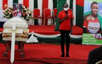 Kenyan athlete Hellen Obiri speaks during the funeral service of long-distance runner Agnes Tirop at Kapnyamisa village