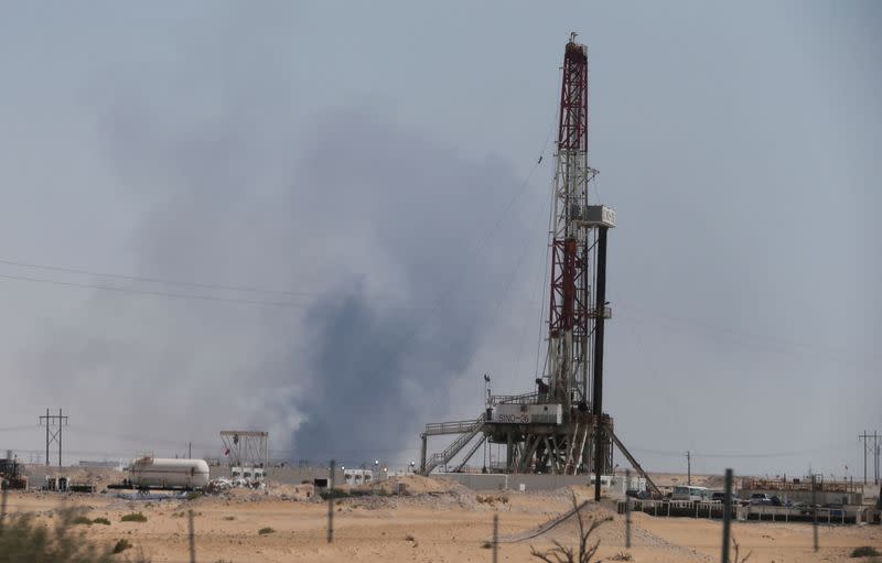 FILE PHOTO: Smoke is seen following a fire at Aramco facility in the eastern city of Abqaiq