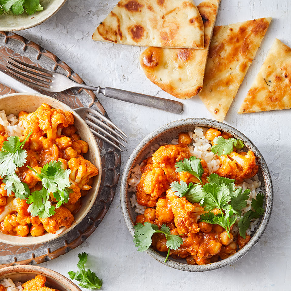 <p>In this vegetarian riff on a popular Indian dish, we swap in cauliflower and chickpeas for the chicken in tikka masala. The cauliflower's nooks and crannies are particularly good at soaking up all the intense flavors of the sauce. Serve over rice for an easy healthy dinner that's ready in just 20 minutes. <a href="https://www.eatingwell.com/recipe/275038/cauliflower-tikka-masala-with-chickpeas/" rel="nofollow noopener" target="_blank" data-ylk="slk:View Recipe;elm:context_link;itc:0;sec:content-canvas" class="link ">View Recipe</a></p>