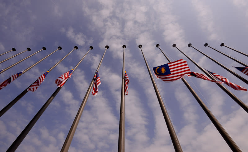 The Jalur Gemilang at half-mast, as Malaysia observes a day of mourning for those killed in the July 17 shooting down of flight MH17. – The Malaysian Insider pic by Nazir Sufari, August 22, 2014.