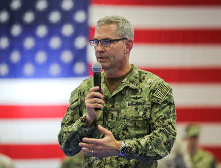 FILE PHOTO: U.S. Navy Vice Adm. Scott A. Stearney, commander of U.S. Naval Forces Central Command/U.S. 5th Fleet/Combined Maritime Forces, delivers remarks during the Naval Amphibious Force, Task Force 51/5th Marine Expeditionary Brigade change of command ceremony in Manama, Bahrain July 3, 2018. U.S. Marine Corps/Sgt. Wesley Timm/Handout via REUTERS/File Photo