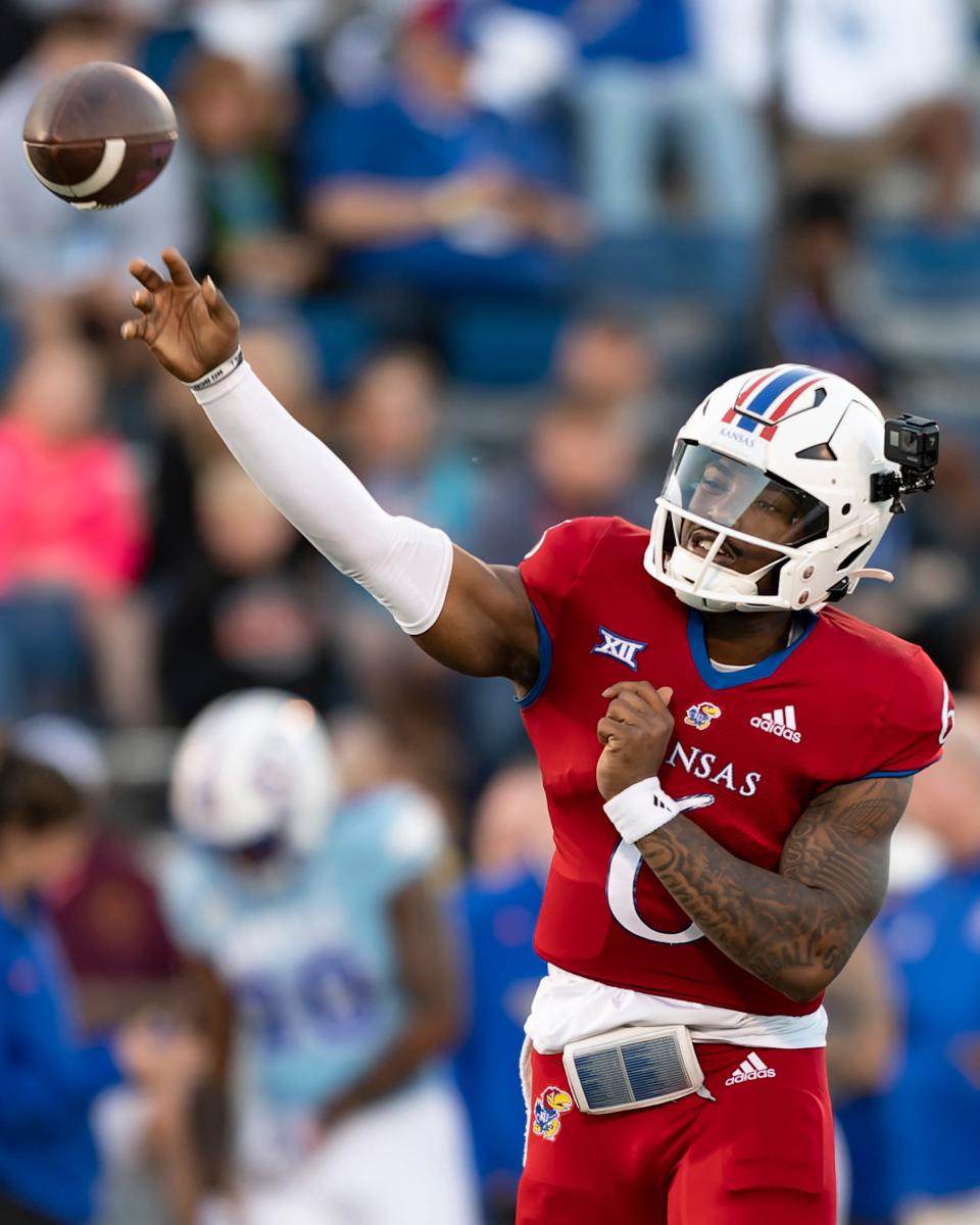 Kansas quarterback Jalon Daniels (6) throws the ball April 7, 2023, during Kansas Football's Spring Showcase at David Booth Kansas Memorial Stadium in Lawrence, Kansas.