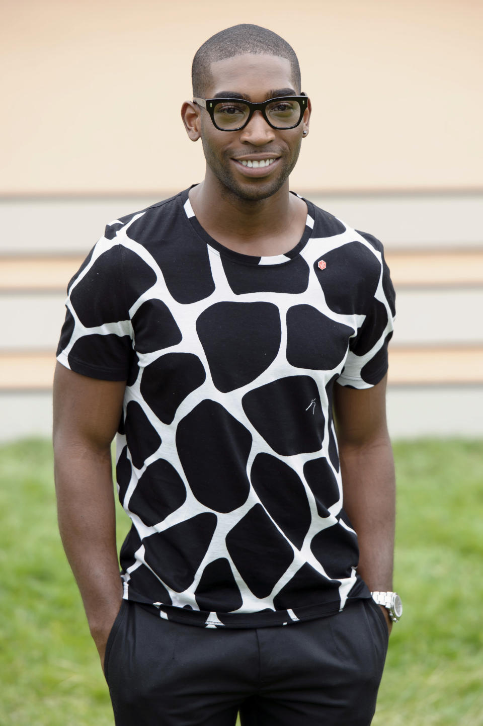 British singer, Tinie Tempah arrives for Burberry Prorsum show, during London Men's spring summer fashion collections 2014, in London, Tuesday, June 18, 2013. (Photo by Jonathan Short/Invision/AP)