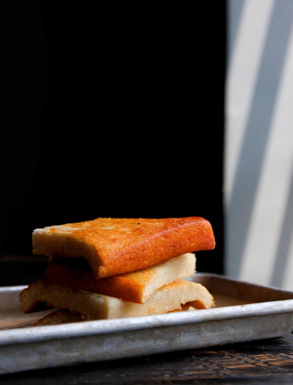 A stack of cornbread is photographed at Sam Jones BBQ in Raleigh, N.C. on Wednesday, June 5, 2024.