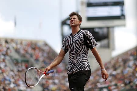 Tennis - French Open - Roland Garros - Alexander Zverev of Germany vs Dominic Thiem of Austria - Paris, France - 28/05/16. Thiem reacts. REUTERS/Gonzalo Fuentes