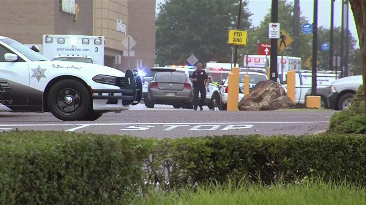 This still image provided by WATN-TV shows police and emergency personnel responding to a shooting at a Walmart in Southaven, Miss., on Tuesday, July 30, 2019. DeSoto County Sheriff Bill Rasco said that one person was killed and the suspect was shot. The shooting prompted a sizeable law enforcement response, with officers setting up a perimeter and entering the Walmart Supercenter.  (Photo: WATN-TV /AP)