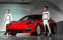 LOS ANGELES, CA - NOVEMBER 16: The new Porsche Panamera GTS is unveiled by race car drivers Romain Dumas (L) and Patrick Long at the LA Auto Show on November 16, 2011 in Los Angeles, California. The car show opens to the public on Friday and runs through November 27. (Photo by Kevork Djansezian/Getty Images)