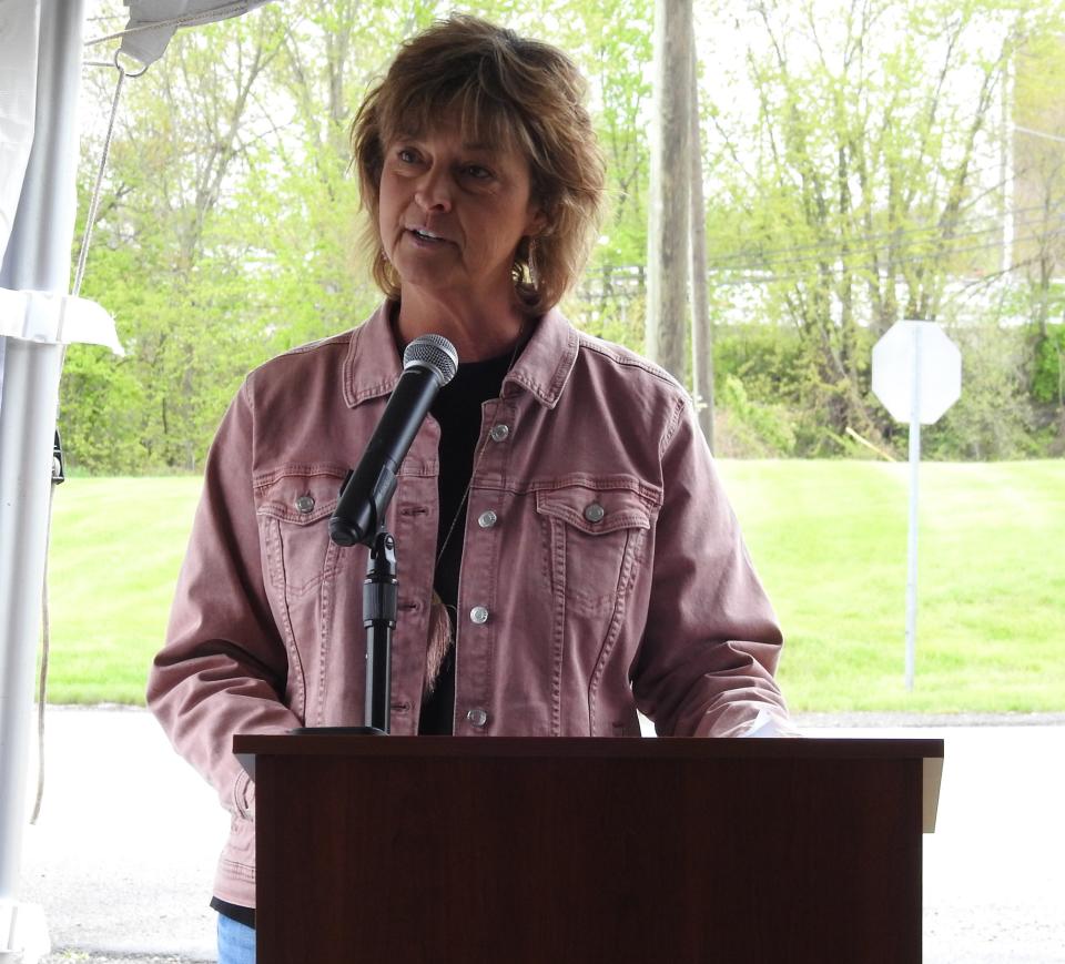 Jandi Smailes, daughter of Skip Ferrell, spoke on behalf of her family at a dedication ceremony for Skip's Landing where Skip's Refuse once stood.