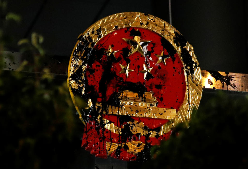 The National Emblem of the People's Republic of China is seen vandalised on the Chinese Liaison Office after a march to call for democratic reforms, in Hong Kong, China July 21, 2019. Picture taken July 21, 2019. (Photo: Edgar Su/Reuters)