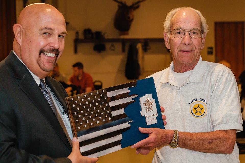 Robert Everett and John Grasselli stand together during Wednesday's event honoring 50-year members of Fraternal Order of Police Tuscora Lodge No. 4.