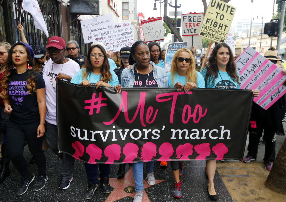 FILE - In this Nov. 12, 2017 file photo, participants march against sexual assault and harassment at the #MeToo March in the Hollywood section of Los Angeles. The number of complaints against California physicians for sexual misconduct has risen 62% since fall of 2017, a jump that coincides with the beginning of the #MeToo movement, according to a newspaper investigation published Monday, Aug. 12, 2019. A Los Angeles Times analysis of California medical board data found complaints of sexual misconduct, though small in number, are among the fastest growing type of allegation. (AP Photo/Damian Dovarganes, File)