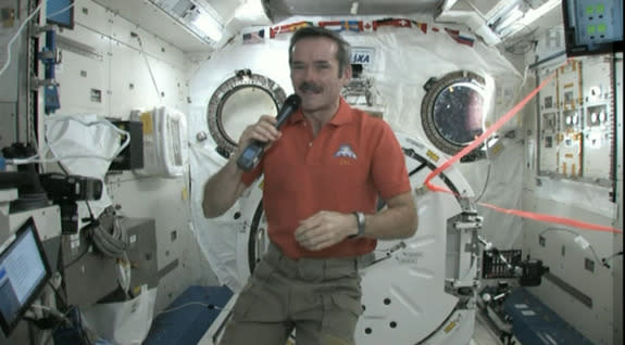 Canadian astronaut Chris Hadfield speaks via phone with "Star Trek" actor William Shatner from the International Space Station on Feb. 7, 2013.