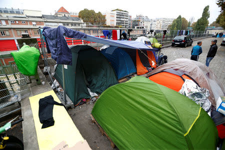 Migrants tents are seen at a makeshift camp on a street in Paris, France, October 28, 2016. REUTERS/Charles Platiau