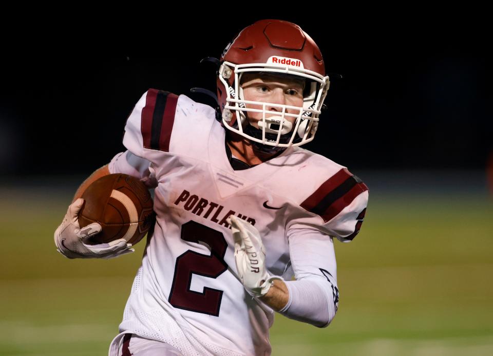 Portland's Drew Miller runs against DeWitt, Thursday, Sept. 1, 2022, in DeWitt.