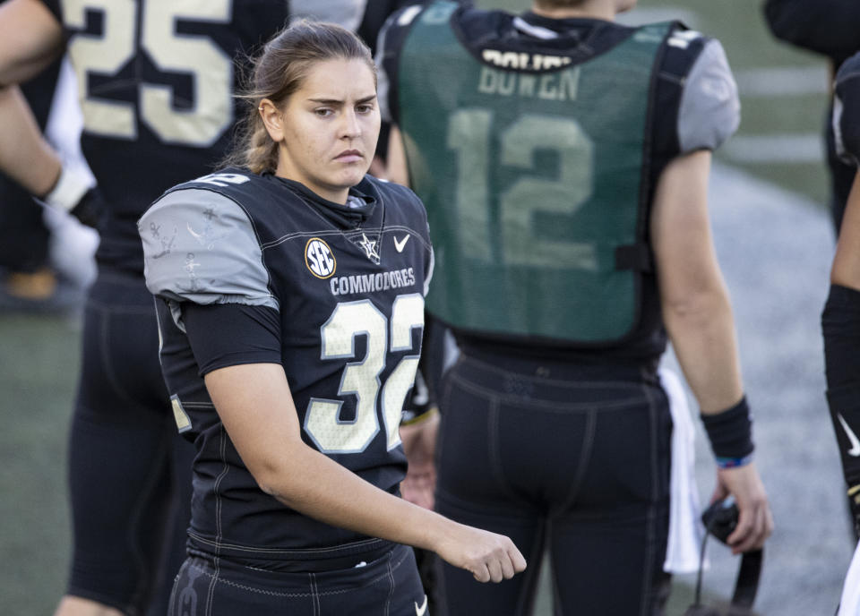 Vanderbilt kicker Sarah Fuller walks along the sideline during the first half of an NCAA college football game against Tennessee, Saturday, Dec. 12, 2020, in Nashville, Tenn. (AP Photo/Wade Payne)