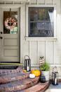 <p>Opt for a wreath that you can leave up all season long, like the one shown here (it's made of paper!). <a href="https://stylebyemilyhenderson.com/blog/target-fall-halloween-decorating-ideas" rel="nofollow noopener" target="_blank" data-ylk="slk:This one;elm:context_link;itc:0;sec:content-canvas" class="link ">This one</a> is great for both Halloween and Thanksgiving, thanks to the faux paper leaves in a fall color palette.</p>