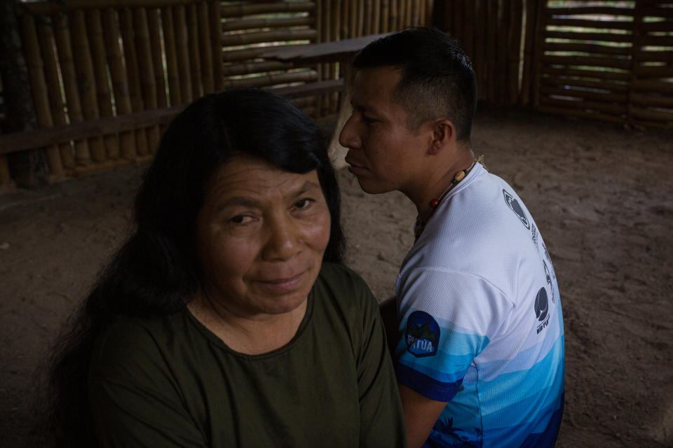 Pablo and his mother Inés Alvarado are residents of the Yayayaku community. They live next to the river and are pictured in their home.<span class="copyright">Andrés Yépez for TIME</span>