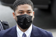 Actor Jussie Smollett arrives Monday, Nov. 29, 2021, at the Leighton Criminal Courthouse for jury selection at his trial in Chicago. Smollett is accused of lying to police when he reported he was the victim of a racist, anti-gay attack in downtown Chicago nearly three years ago. (AP Photo/Charles Rex Arbogast)