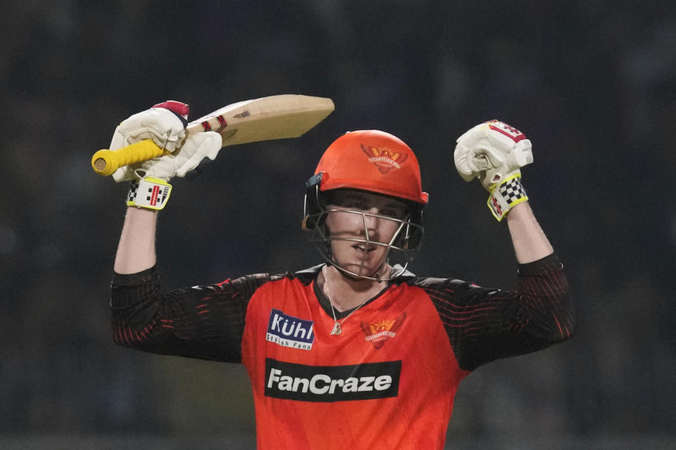 Sunrisers Hyderabad's Harry Brook celebrates his century during the Indian Premier League cricket match between Kolkata Knight Riders and Sunrisers Hyderabad in Kolkata, India, Friday, April 14, 2023. (AP Photo/Bikas Das)