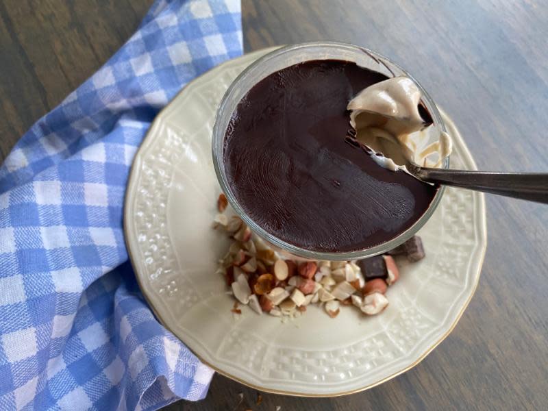 A thin layer of melted dark chocolate, forming a shell atop the cup of peanut butter yogurt adds flavonoids and makes each serving very enticing.