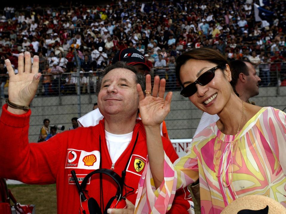 Jean Todt and Michele Yeoh at the Grand Prix of Chine on 26 September 2004.