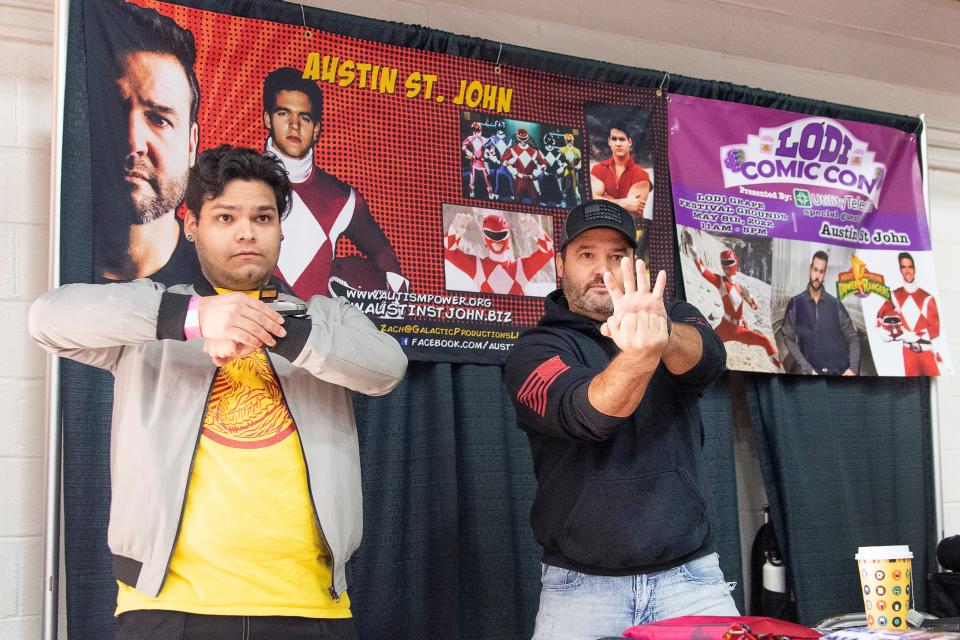 Shankar Dhillon (left) does the next â€œYellow in space rangerâ€ pose while Austin St. John does his famous Power Ranger pose at the Lodi Comic Con at Lodi Grape Festival on May 8th. Dianne Rose/For The Record