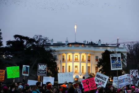 Demonstrators take part in the Women's March to protest Donald Trump's inauguration as the 45th president of the United States close to the White House in Washington, January 21, 2017. REUTERS/Lucas Jackson