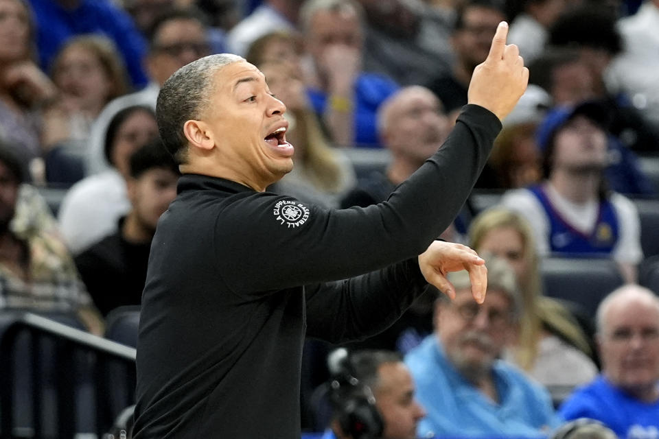 Los Angeles Clippers head coach Tyronn Lue directs his team on the court during the first half of an NBA basketball game against the Orlando Magic, Friday, March 29, 2024, in Orlando, Fla. (AP Photo/John Raoux)