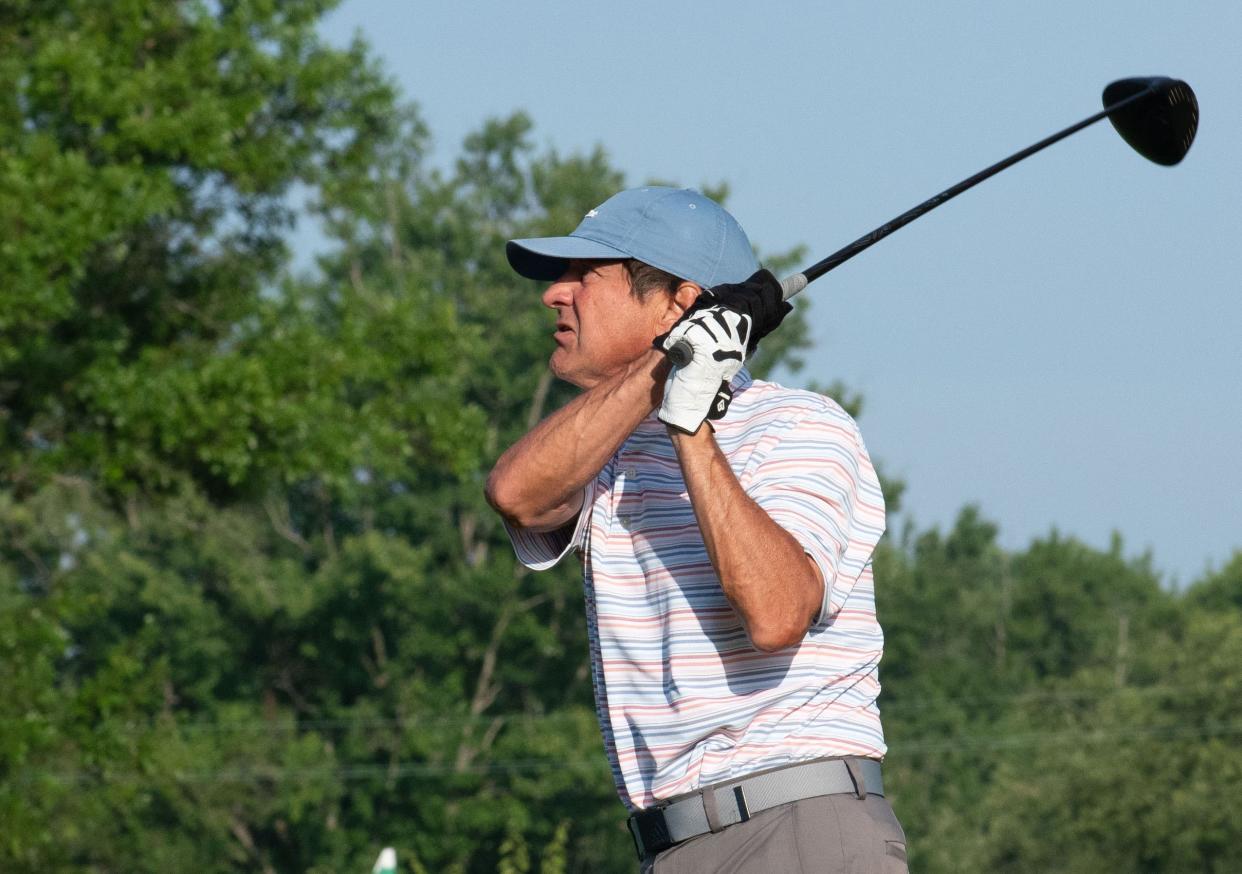 Gary EuDaly tees off the second hole at Cascades Golf Course in the Bloomington City Golf Tournament on July 9, 2023.